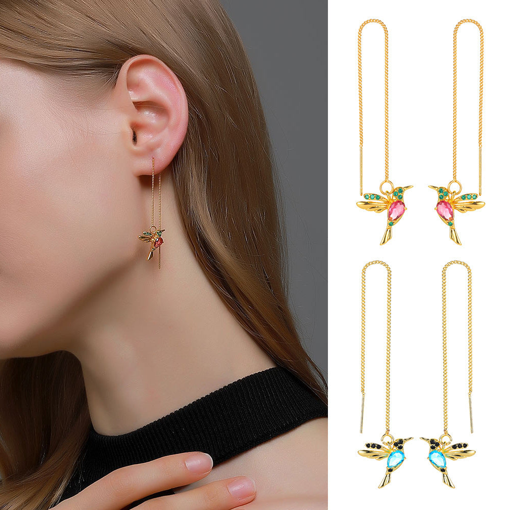 PSYCHE | GOLD HANGING HUMMINGBIRD EARRINGS